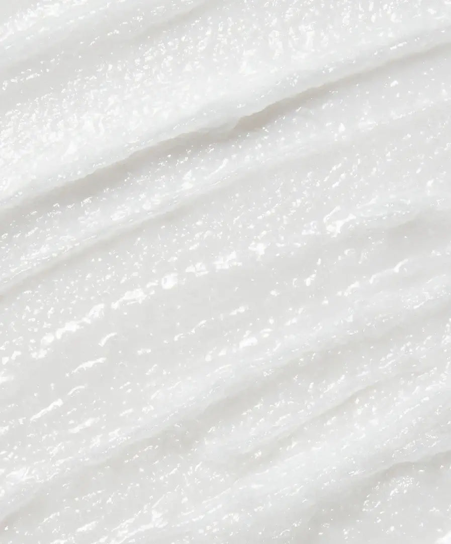 Raw coconut cream cleanser rich cream texture, macro